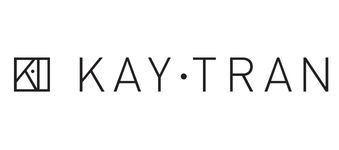 A minimalist logo featuring a square geometric icon on the left and the words KAY • TRAN in clean, modern uppercase letters on the right.